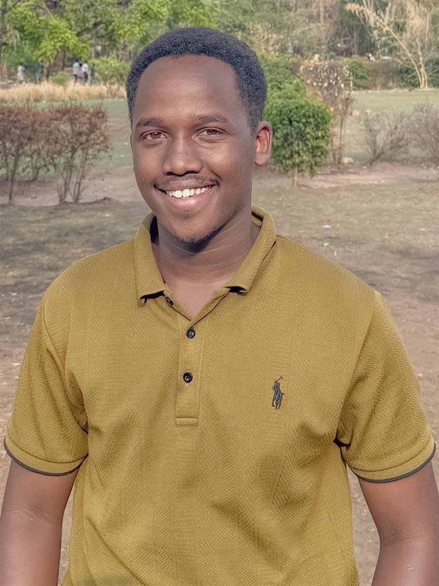 Girishaka Miché Tévin smiling outdoors